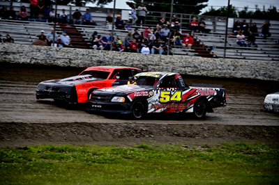 Josh Terry (43) wins over Tyler Irwin (54) in the Hartson Total Opening Renegades A Main