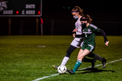 Chazy's Celine Juneau wins the race to the ball ahead of Seton's Abby Pearl. Chazy's Celine Juneau wins the race to the ball ahead of Seton's Abby Pearl.
