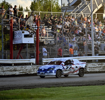 Jacob Fountain (22) takes the checkered flag in the Taylor Rental 4-Cylinders A Main