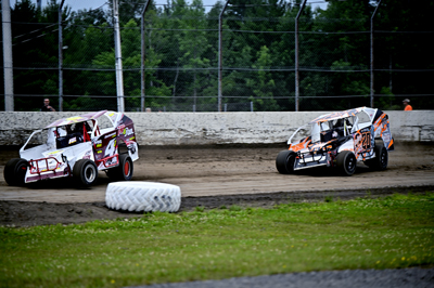 Justin Severance (4J) wins over Bucko Branham (20) in the J&S Steel Sportsman Modifieds A Main