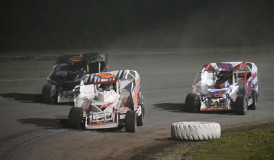 Zack Arquiett (14) wins the Crossroads Tobacco Sportsman Modifieds A Main