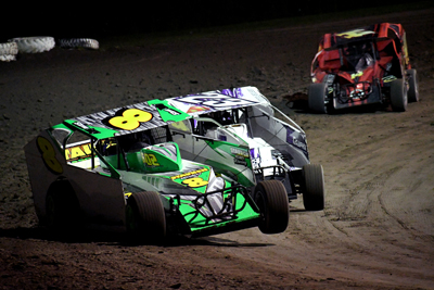 Steve Bushey (8) battles with Pryor Stacey (23) in the Novice Sportman Modifieds A Main