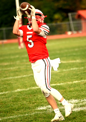 leaping along the sidelines