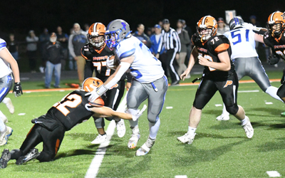 knocks down the would be tackler knocks down the would be tackler