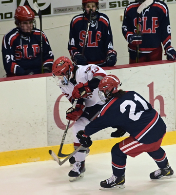 hard into the boards hard into the boards